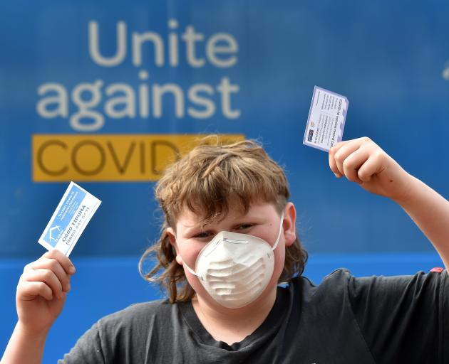 Harper Wilson (12), of Dunedin, celebrates getting the jab during Super Saturday in Dunedin....