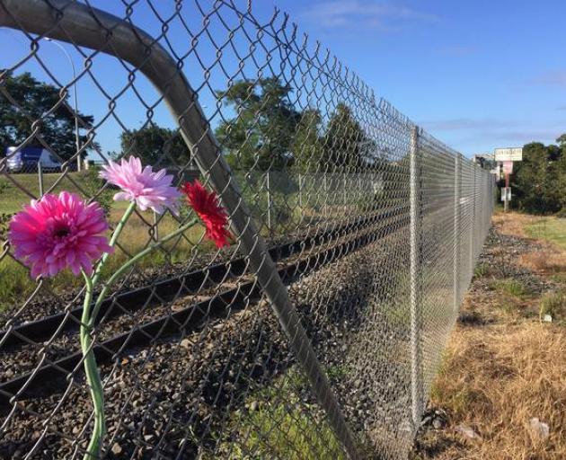 Flowers have been left at the site of the accident. Photo: NZ Herald 