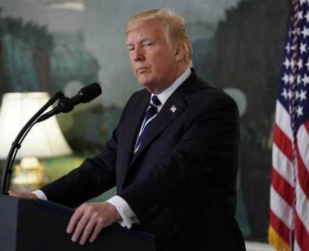 US President Donald Trump planned to lead a moment of silence to mourn the dead at the White House. Photo: Reuters US President Donald Trump planned to lead a moment of silence to mourn the dead at the White House. Photo: Reuters