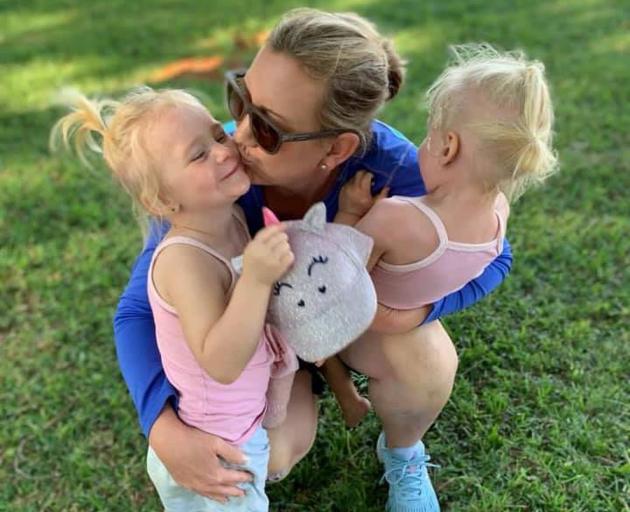 Lauren Dickason with her twin daughters Maya and Karla. Photo: Facebook