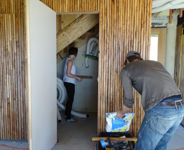 Much of the ventilation system is out of sight under the stairs.