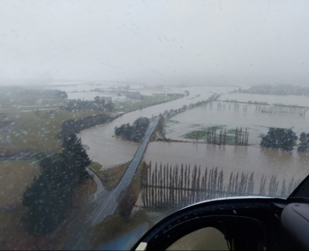 An aerial view of flooding on the Waikouaiti River over SH1 near Hawkesbury Village. Photo: Chris...
