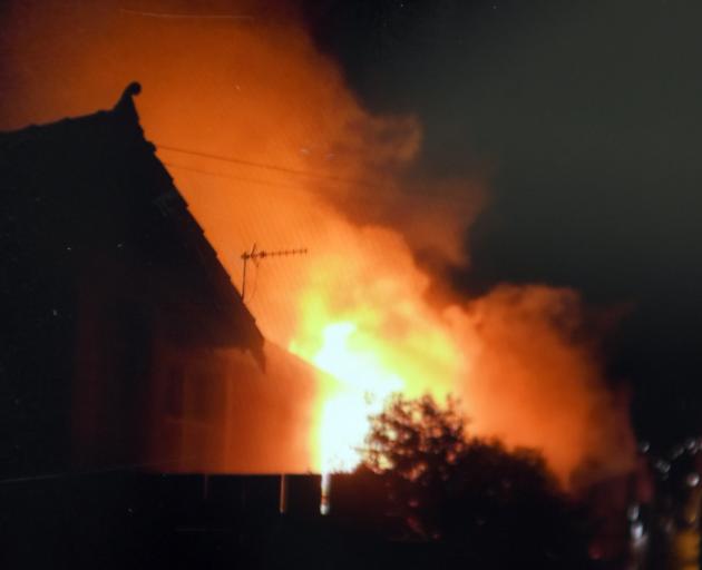 The house was well ablaze when fire crews arrived shortly after 5.15am. Photo: Mel Ryall