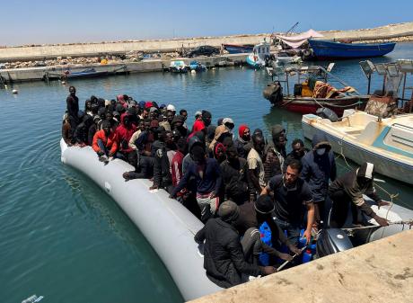 Migrants rescued by the Libyan coastguard in the Mediterranean Sea arrive in Garaboli, Libya,...