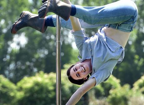 Shannon Miller shows the skills which won her a national pole performer title. PHOTO: PETER MCINTOSH