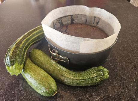 To dehydrate your zucchinis, grate them and squeeze out as much juice as you can. Photo: Hilary...