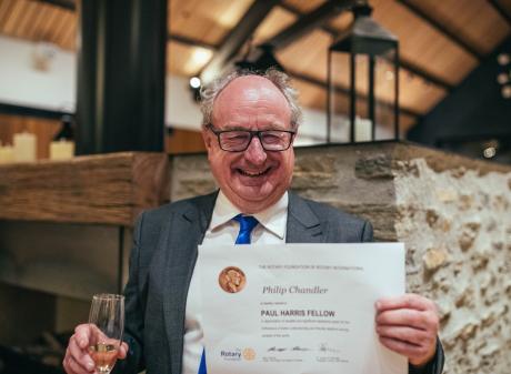 Scene’s chief news hound Philip ‘Scoop’ Chandler has been presented a Paul Harris Fellowship by...