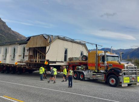 King House Removals staff wait on the side of the road near Queenstown to let traffic past late...