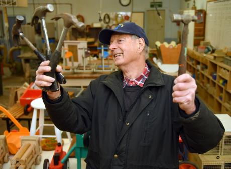 Taieri Bloke Shed president Nick Wilson holds hammers for today’s garage sale. PHOTO: STEPHEN...
