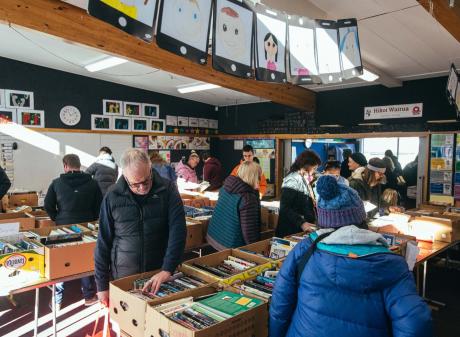 People look through the offerings at the St Joseph’s Primary School book fair in Queenstown...