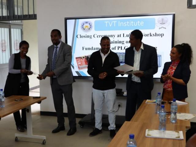 Photo shows Mahlet Tsegaye (first from the left) receiving her trainer’s certificate from the...