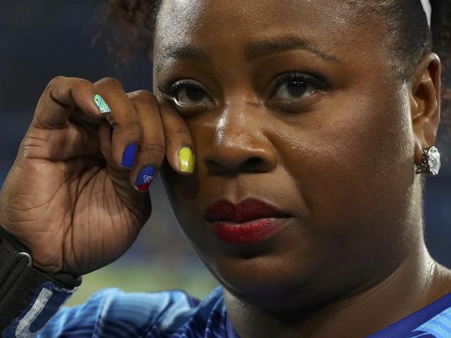 Caption: An emotional Michelle Clark after winning the gold. Photo