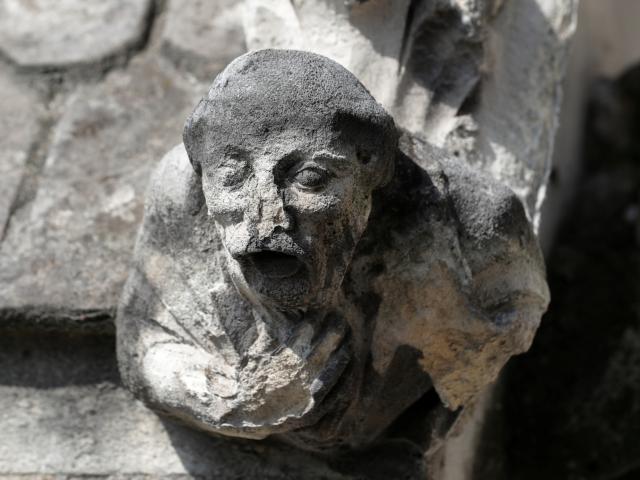 A damaged gargoyle. Photo: Reuters 