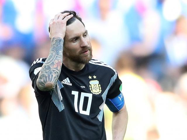 A dejected Lionel Messi, who has now missed four of his last seven penalties. Photo: Reuters
