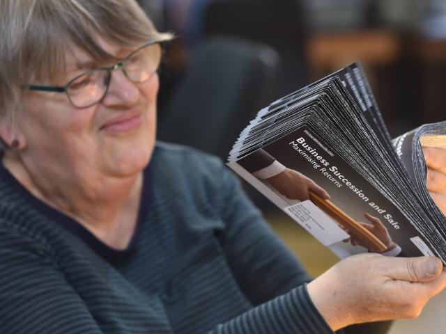 Jacqueline Hewson does some postal sorting. PHOTO: PETER MCINTOSH