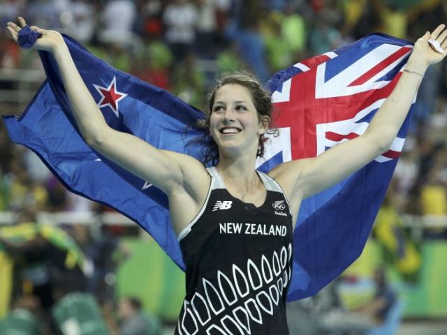 Eliza McCartney celebrates after winning the bronze medal in the pole vault at the Rio Olympics....