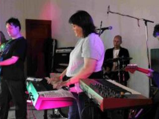 The original line-up of the Chills, (from left) Jane Dodd, Martin Phillipps, Rachel Devereux (nee Phillipps), Alan Haig and Peter Gutteridge, plays at the concert. Photo by Gerard O'Brien.