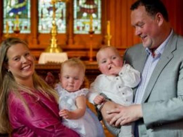 Jane and Martin Weekes had twins Parker (with Martin) and Poppy christened. Photo NZ Herald