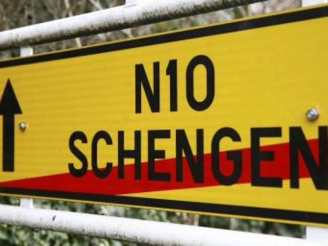 A street sign marks the end of the small Luxembourg village of Schengen last week. The Schengen Agreement with the goal to eliminate internal border controls was signed on June 14, 1985, in the small village at the  Moselle River and the tripoint of Franc