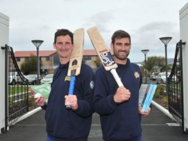 Otago cricketers and teachers Bradley Scott and Brad Rodden take a break from the classroom and the cricket field at King's High School yesterday. Photo by Linda Robertson.