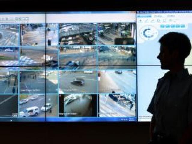 Inspector Mel Aitken watches CCTV footage from the Octagon at the District Command Centre in Dunedin yesterday.  Photo by Stephen Jaquiery.