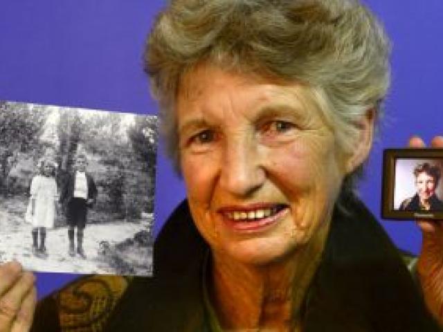 Dawn Coburn with a photo of her aunt and uncle, Agnes and Harry Beattie, of Middlemarch, as children, taken nearly 100 years ago. Mrs Coburn is collating photographs of life in the area from the 1950s to the present day. Photo by Peter McIntosh. Dawn Coburn with a photo of her aunt and uncle, Agnes and Harry Beattie, of Middlemarch, as children, taken nearly 100 years ago. Mrs Coburn is collating photographs of life in the area from the 1950s to the present day. Photo by Peter McIntosh.
