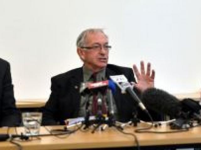 Dunedin City Council hearings committee chairman Cr Colin Weatherall (centre) presents the waterfront hotel resource consent decision to media yesterday, flanked by committee members Crs Andrew Noone  and Kate Wilson. Absent is commissioner John Lumsden, 