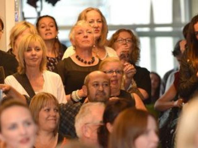 An appreciative audience enjoys a welcome speech by iD Dunedin Fashion Week committee chairwoman Susie Staley, at the official launch of the 15th annual event in the Dunedin Centre last night. Photo by Peter McIntosh.
