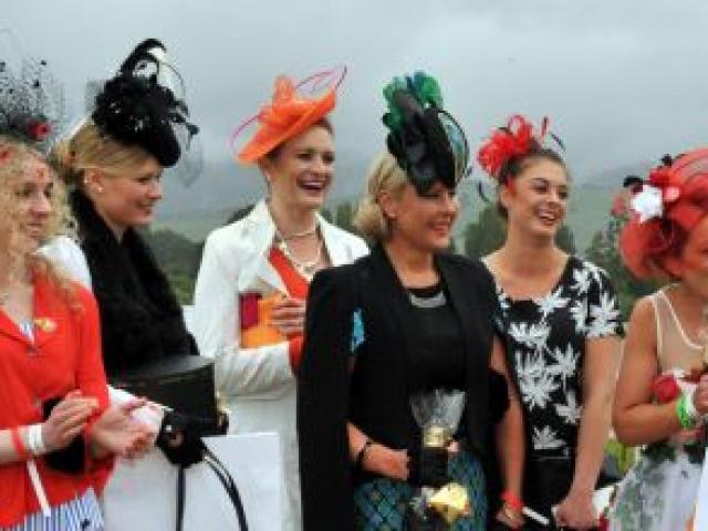 Wingatui Fashions on the Field winner Anna Campbell (front centre) flanked by finalists. Photo by Christine O'Connor. Wingatui Fashions on the Field winner Anna Campbell (front centre) flanked by finalists. Photo by Christine O'Connor.