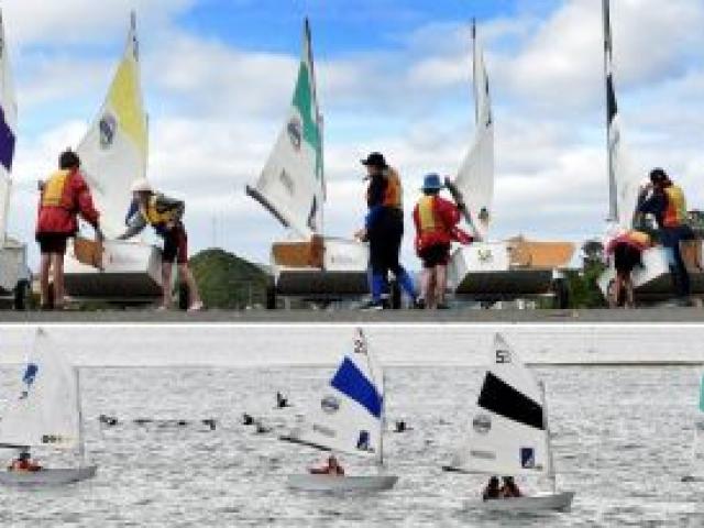 Pupils from Dunedin’s Rudolf Steiner school get ready (top) and then set sail (above) in a fleet of Optimists on Otago Harbour yesterday, as part of Yachting New Zealand’s ‘‘Volvo Sailing ... Have a Go!’’ programme. Photos by Peter McIntosh.