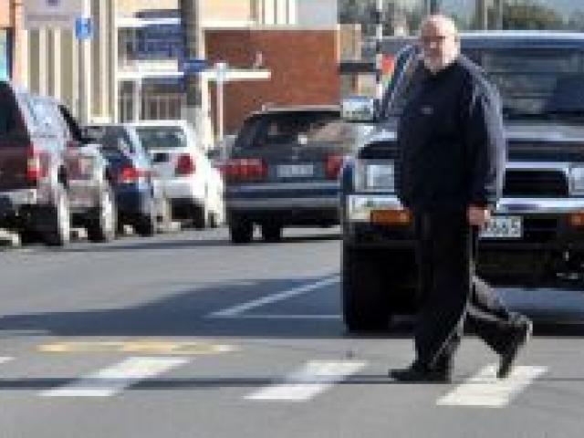 Neville Poole wants action on the Green Island pedestrian crossing. Photo by Craig Baxter.