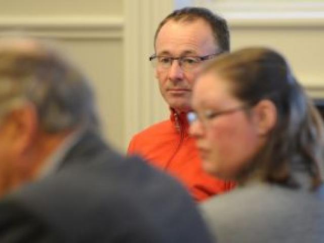 Developer Russell Lund listens during a Dunedin City Council panel hearing yesterday. Photo by Craig Baxter.