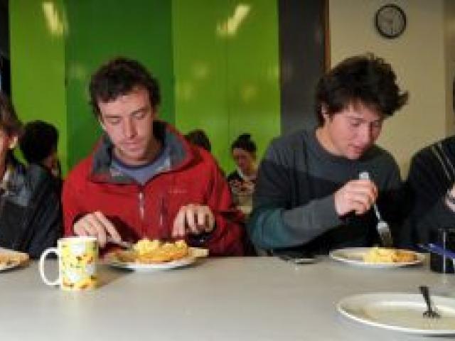 University of Otago students (from left) James Fleming (21), Ollie Behrent (22), Ross Emery (21) and Declan Pearson (20) tuck into a free cooked breakfast at the OUSA Clubs and Societies building yesterday. Photo by Gregor Richardson.