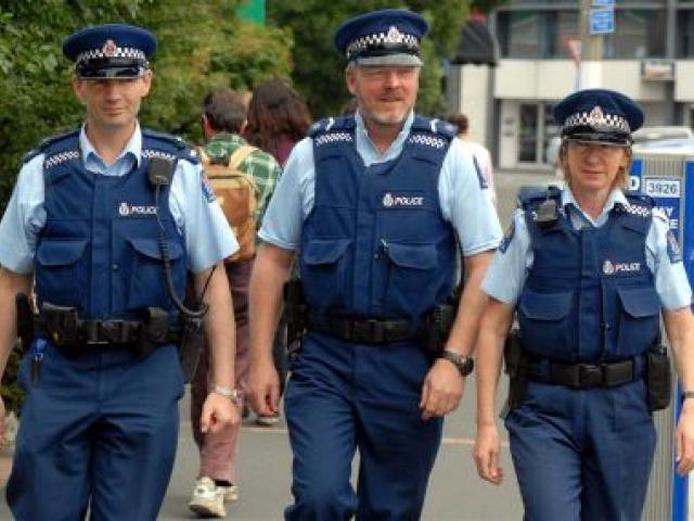 Walking Dunedin's streets are three community policing members (from left) Constable Neil Kettings, Senior Constable Niall Shepherd and Constable Jan Craig. Photo by Gregor Richardson.