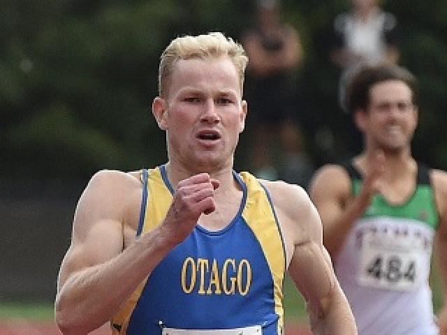 Andrew Whyte on his way to winning the senior men’s 400m national title in Dunedin last month. Photo by Gregor Richardson.