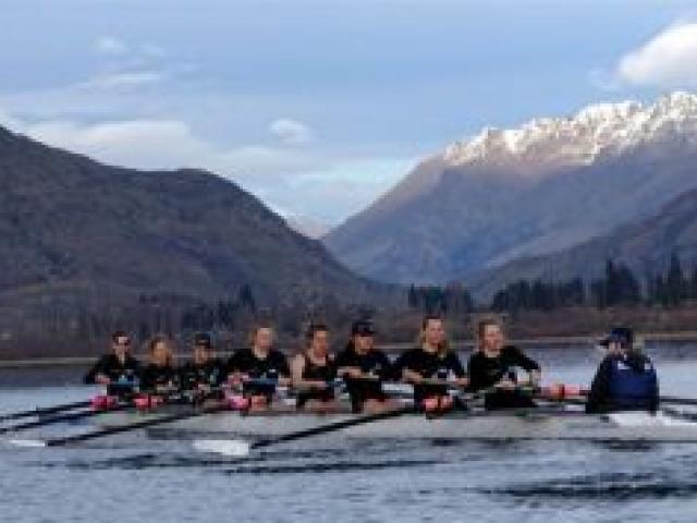 The New Zealand Universities women's rowing eight races on Lake Hayes yesterday. Photo by Guy Williams.