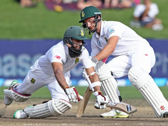 Hashim Amla (left) and Theunis de Bruyn collide, resulting in de Bruyn being run out. Photo: Getty Images 