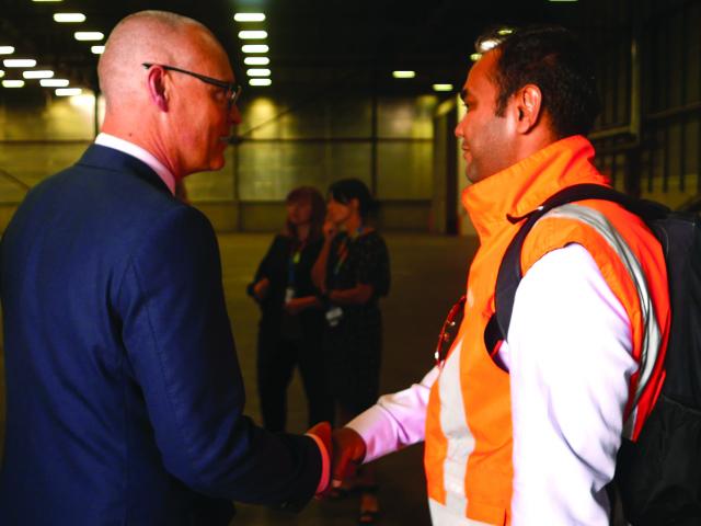 Health Minister Hon. Dr David Clark and Ceres Operations Manager Swaroop Gowda inside the former...