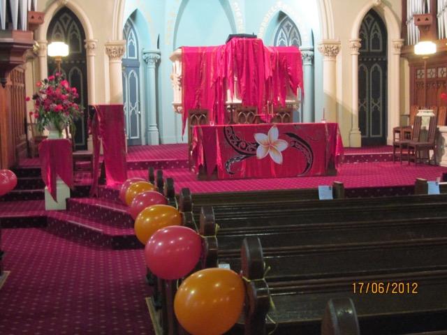 The sanctuary of the Church dressed in RED! The colour for Pentecost