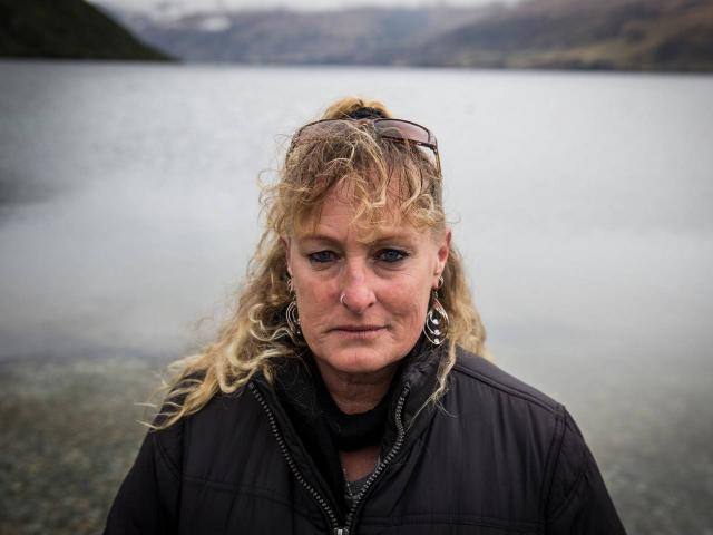 Nicola Cruickshank on the shores of Lake Wakatipu near where she last saw her daughter Amber-Lee....