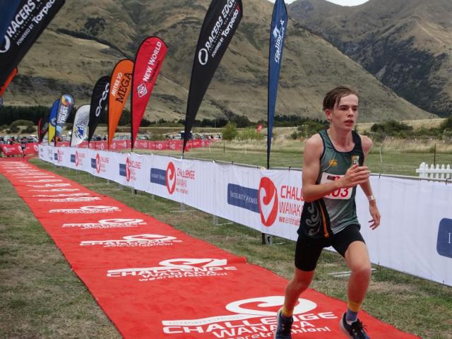 George Abbott (Bayfield High School) finishes his run at Challenge Wanaka. PHOTO: SUPPLIED