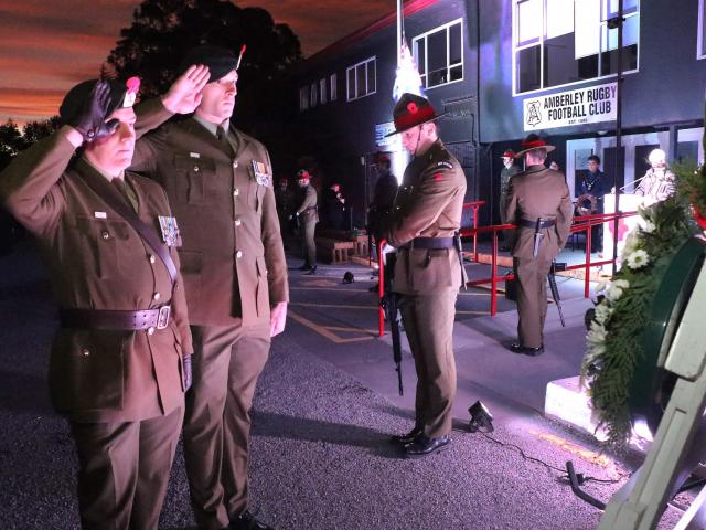 Army Captain Arno Bekker and Lance Corporal Dylan Fisher laid a wreath at the dawn service on...