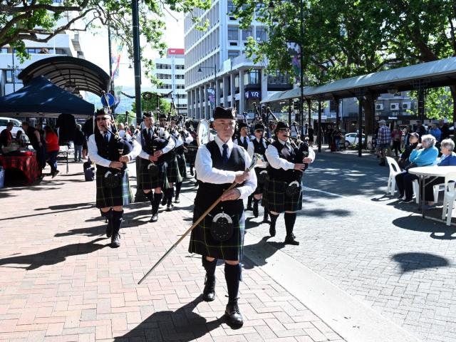 Skirl of the pipes . . . Drum major Andrew McLellan leads the City of Dunedin Pipe Band into the...