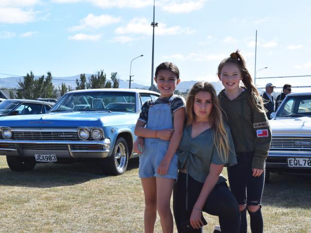 Fun day out . . . Posing in front of a 1965 Chevrolet Caprice during last year’s 31st Great USA...