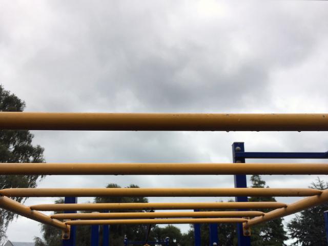 Monkey bars and a see-saw (right) at the Market Reserve playground. 