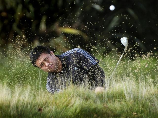 All Black Keven Mealamu shows a delicate touch escaping from a green-side bunker on the fourth...
