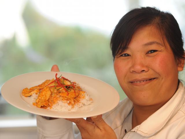 Lek (Pohpimol) Findlater with Panang chicken. Photo by Peter McIntosh.