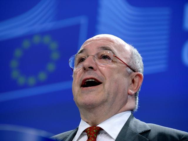 European Union Competition Commissioner Joaquin Almunia holds a news conference regarding...