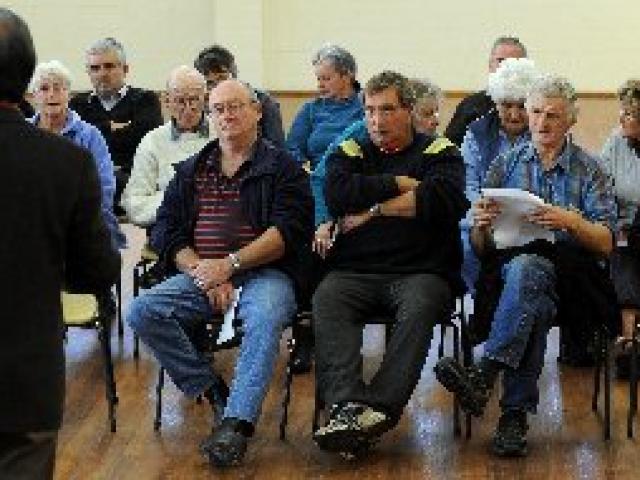 Former Dunedin mayor Peter Chin runs a meeting at Wingatui Hall last night to discuss its future....
