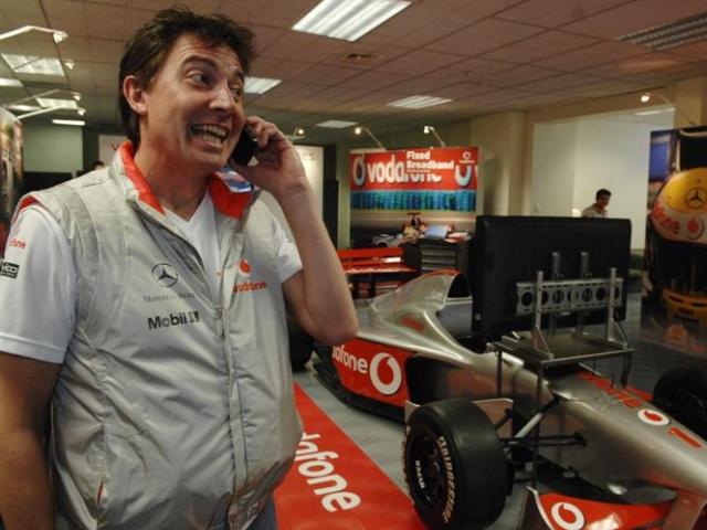 Jurgen Chrustowski takes a call at the company's business expo in Dunedin yesterday. Photo by...